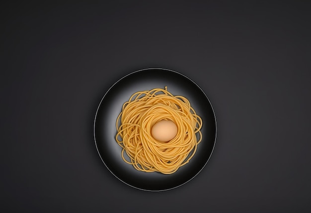 Photo a black bowl with a egg and spaghetti on it