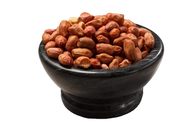 Black bowl with peanuts on white isolated background