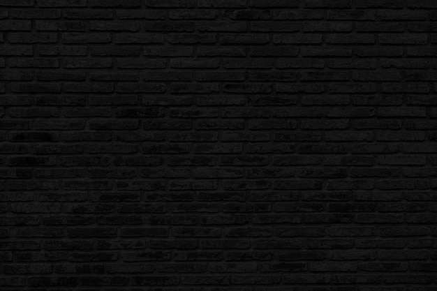 Photo black brick wall texture background wallpaper for interior and exterior and backdrop design