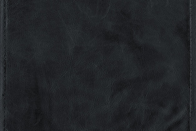 Black bright macro photo of texture of the genuine faux vegan leather