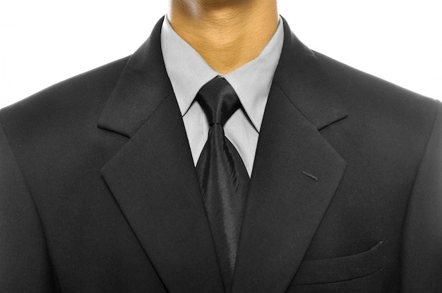 Black business suit with tie isolated over white background