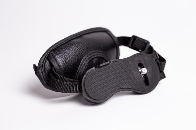 Black camera hand strap made of genuine leather with a metal carabiner for attaching to the camera