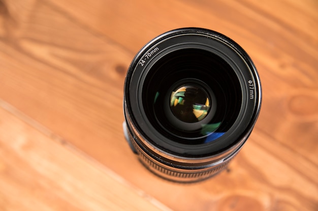 Black camera lens on the table