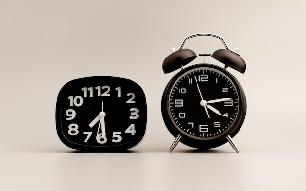 Black clock on gray background time concept that matters to life and work