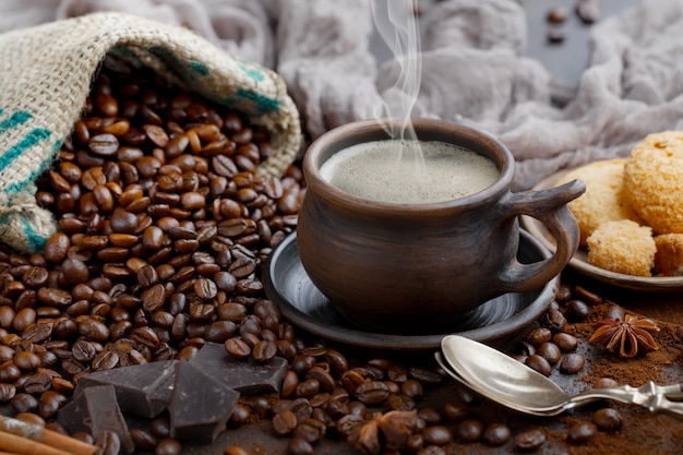 Black coffee beans on an old background