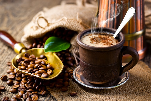 Black coffee beans on an old background