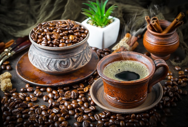 Black coffee beans on an old surface