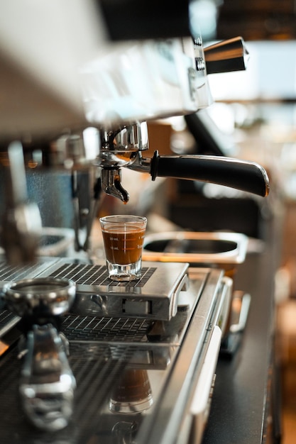 black coffee with milk on a coffee maker