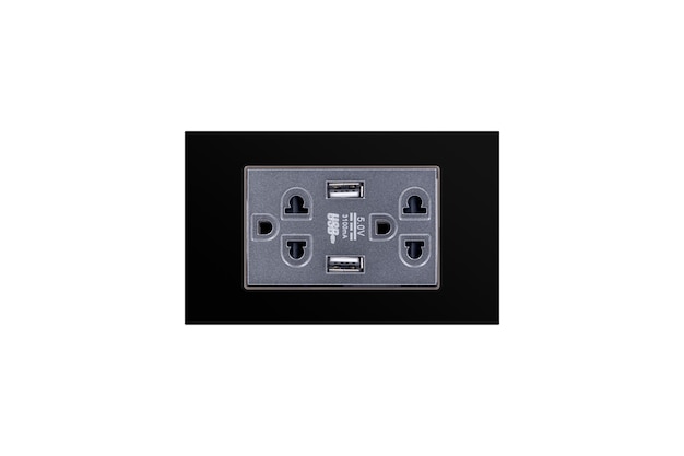 Black color wall outlet AC power plug with USB 5.0V DC output socket for charger isolated on white background.