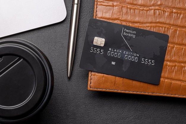 Black credit card on office table