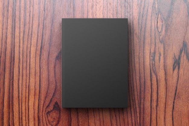 Photo black diary on a wooden table mock up