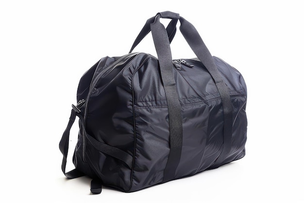 A black duffel bag resting on a white surface ideal for travel or gym use with ample space and sturdy handles