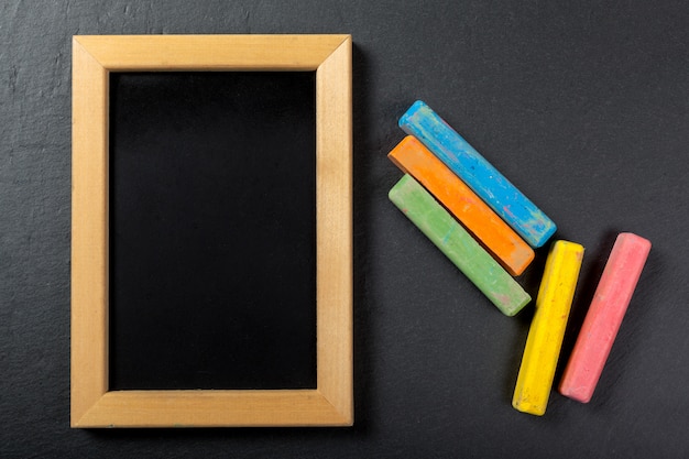 Black empty chalkboard frame