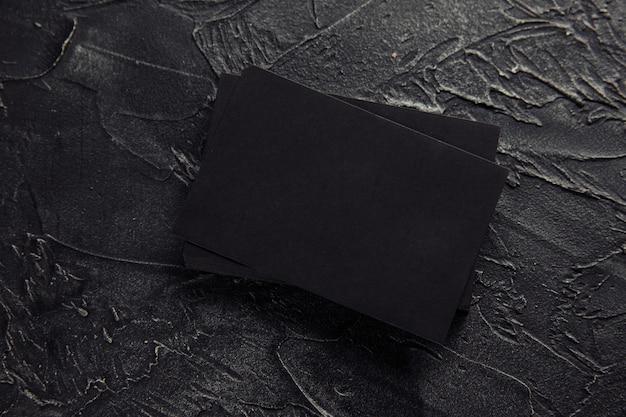 black envelopes on a dark background