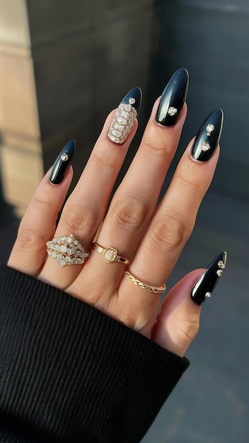 Black and gold manicure with diamonds