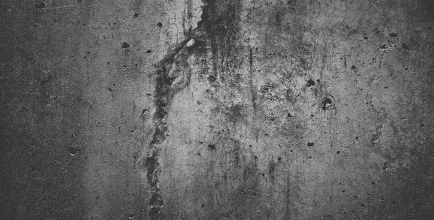 Black grainy stone texture backgroundor dark gray textured background