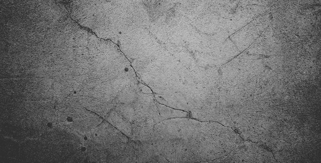 Black grainy stone texture backgroundor dark gray textured background