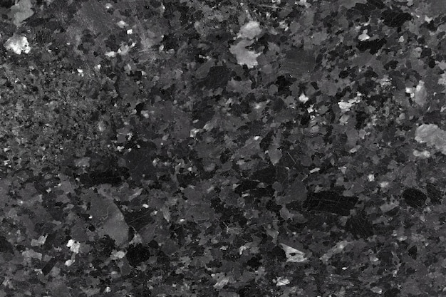 Black granite rock texture. High resolution photo.