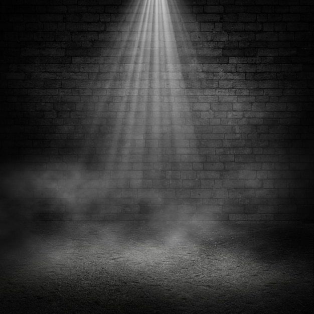 Black grunge interior wall background with smoky atmosphere and spotlight