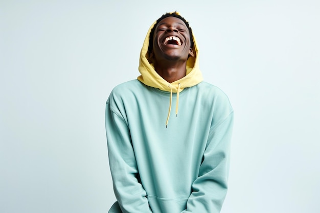 black guy smiling wearing blue long sleeve shirt on white background people photo