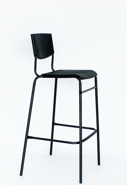 Black high bar stool on a white background A modern model Comfortable furniture for a bar or restaurant