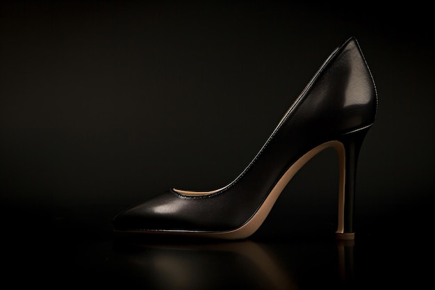 a black high heeled shoe