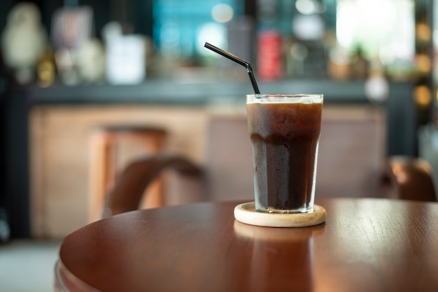 Black ice coffee on wood desk