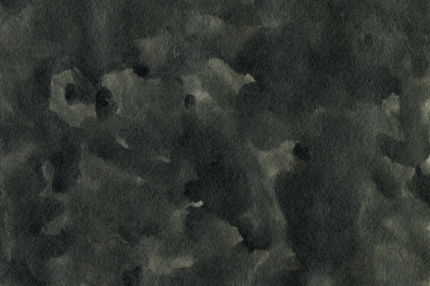 Black ink texture painted on watercolor paper background