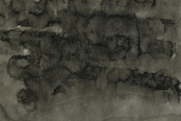 Black ink texture painted on watercolor paper background