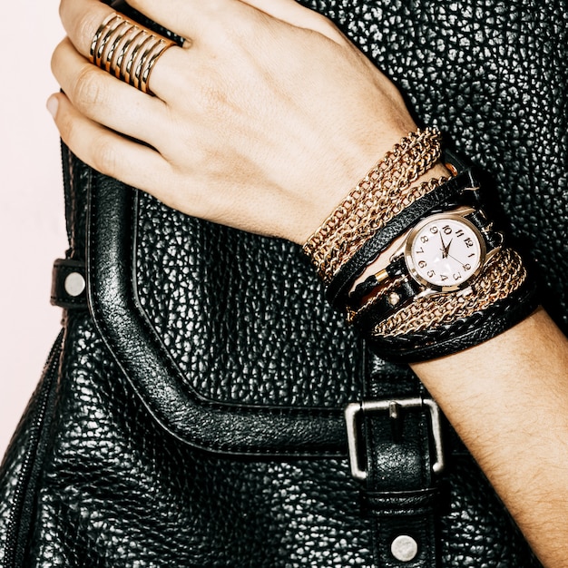 Black Jewelry fashion. Bracelets, watches and rings. Be glamorous lady.