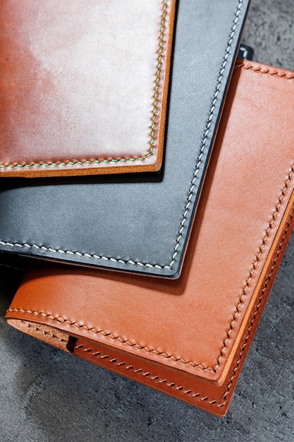 Black leather cardholder on a gray background Handmade leather products