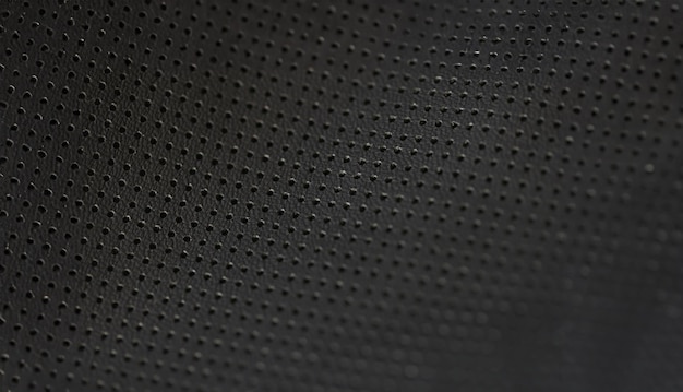 Black leather fabric pattern of small holes wallpaper