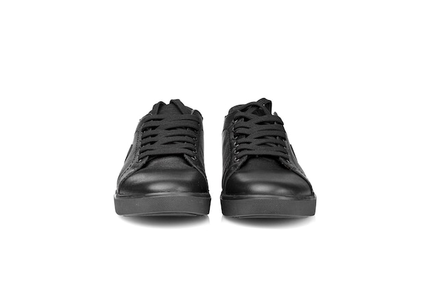 black leather sneakers on a white background closeup