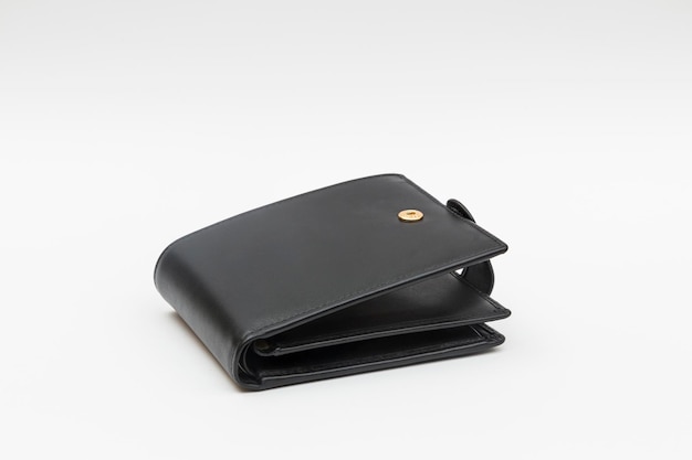 Black leather wallet wallet ajar on white background