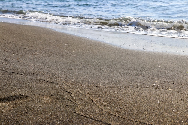 Black magnetic sand beach of Black sea in Ureki, Georgia