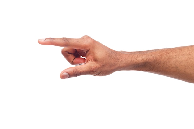 Black male hand measuring invisible items, man's palm making gesture while showing small amount of something on white isolated background