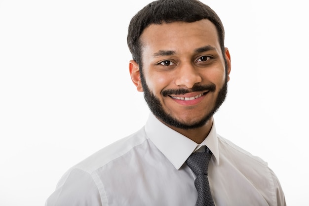 Black manager on white background smiling clerk