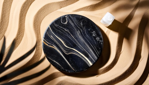 Photo black marble plate on sand