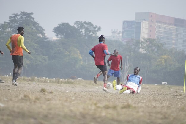 black men playing football