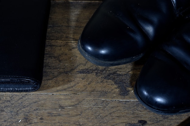 Black men's shoes and leather wallet