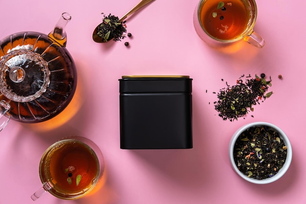 Black metal packaging for tea Tea branding and packaging mockup Blank tea packaging mockup with tea to display your branding design