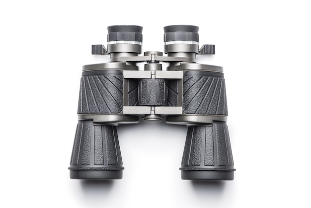 Black modern binoculars over white background