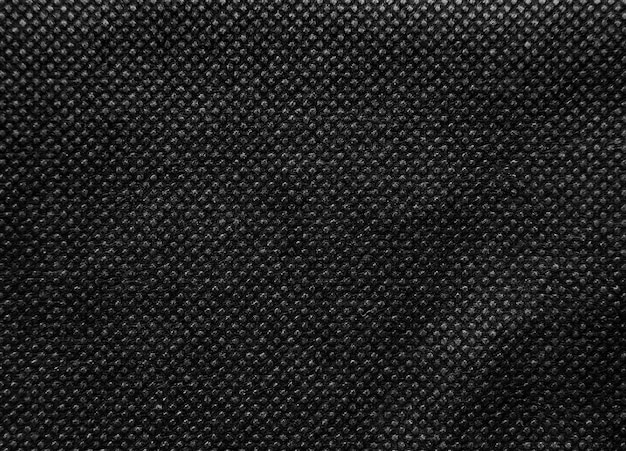 Black nonwoven fabric texture backgroundxA