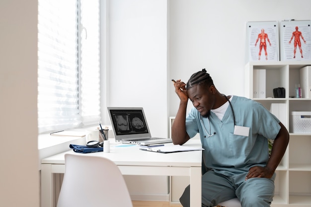 Black nurse at their workspace