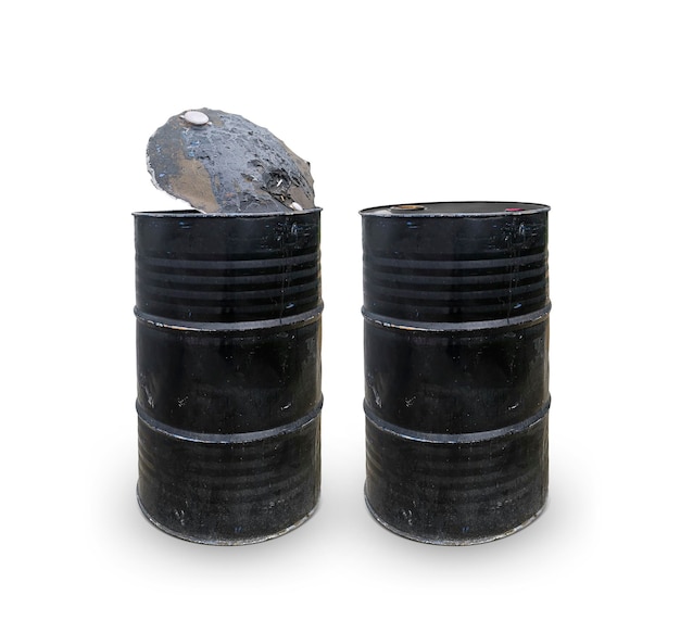 Black oil barrels on a white background