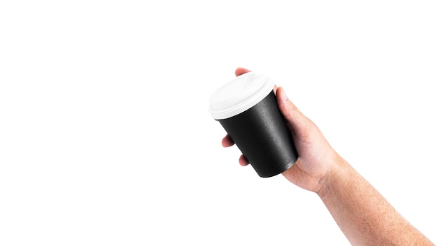 Black paper cup in hand isolated on white background. High quality photo