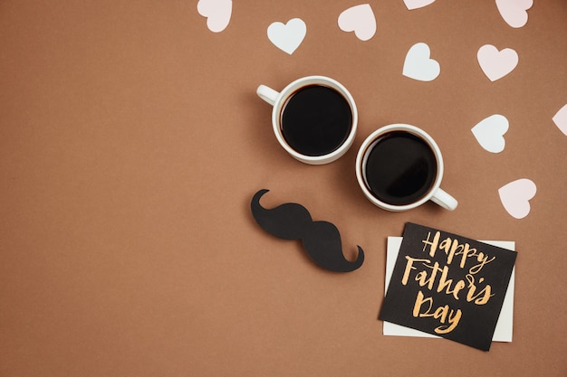 Black paper moustache with a greeting card