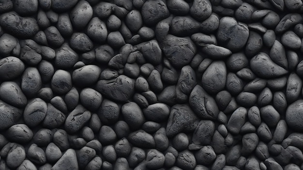 Black pebbles background texture Top view