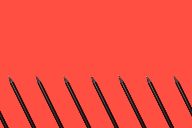 Black pencils on a red background geometric pattern