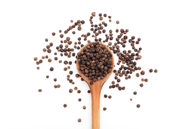 Black pepper on white background